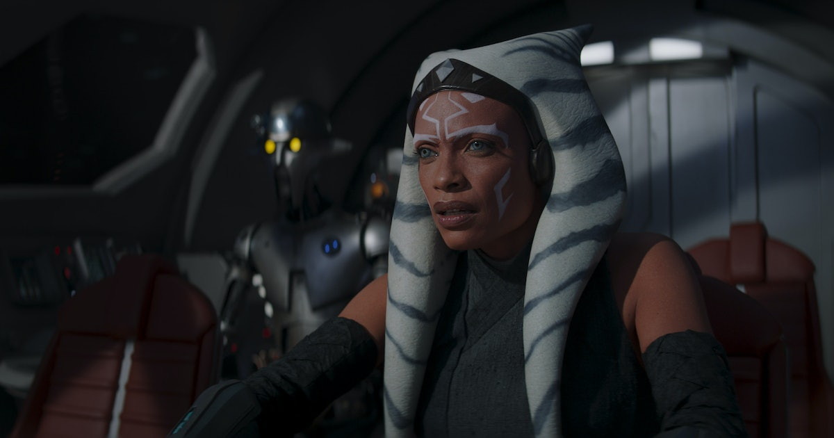 Ahsoka Tano (Rosario Dawson) looks surprised as Huyang the droid hovers in the background in 'Ahsoka'