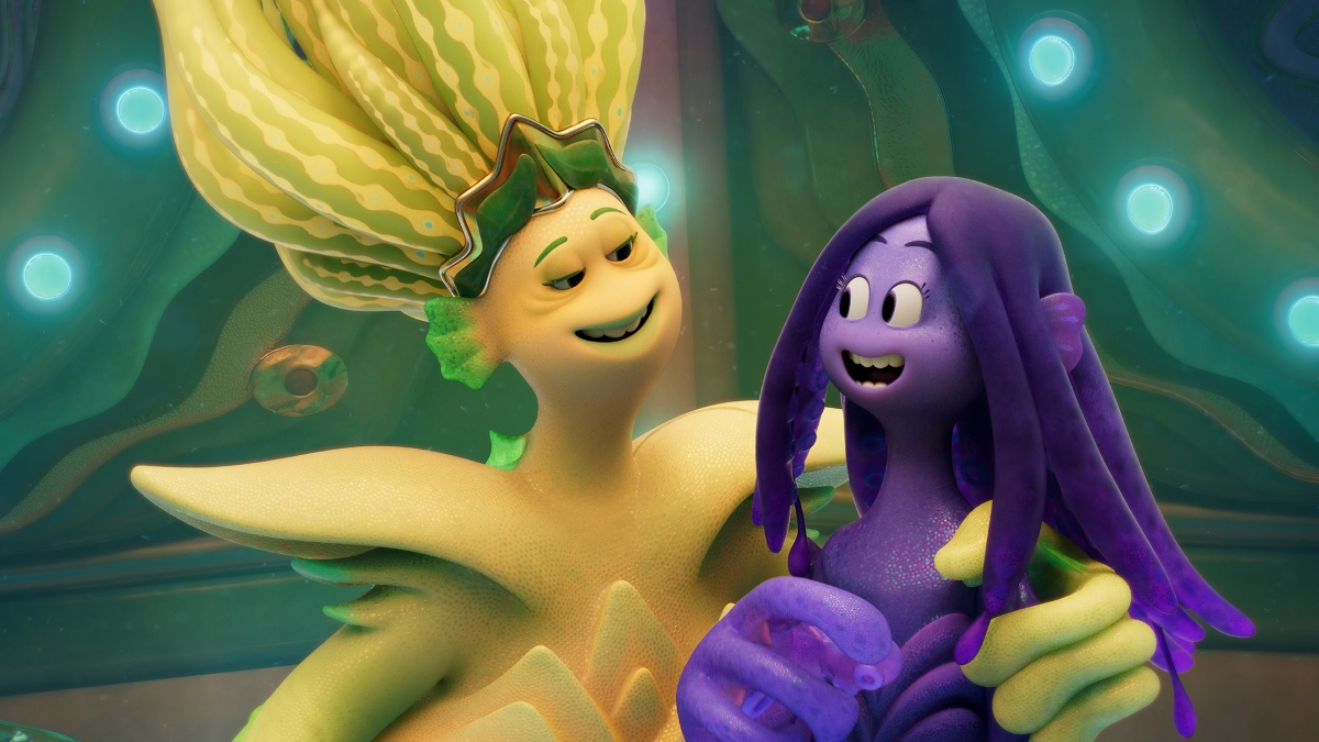 a yellow anthropomorphized sea creature putting her arm around the shoulders of a purple anthropomorphized sea creature; it is a grandmother and a a granddaughter from the 3D animated movie Ruby Gillman Teenage Kraken