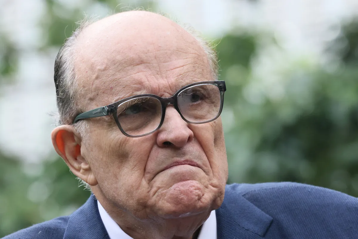 Rudy Giuliani making an upset face.