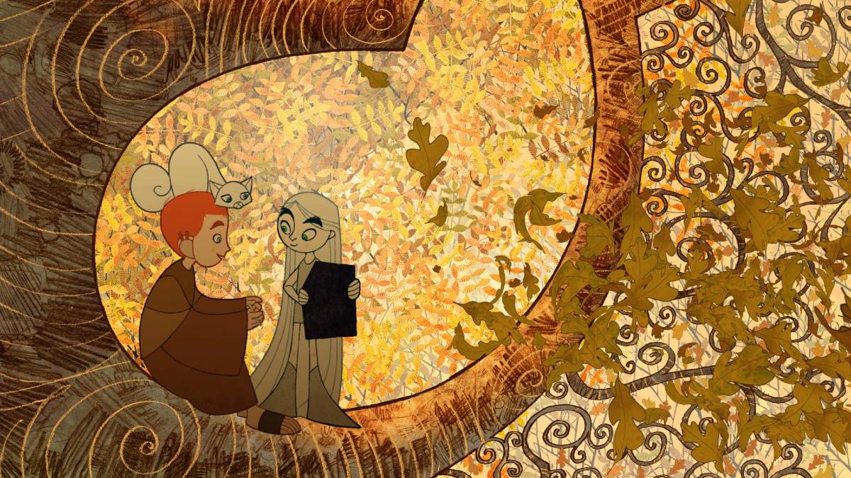Two children sit in a stylized fall colored tree with a white cat in 'The Secret of the Kells.'