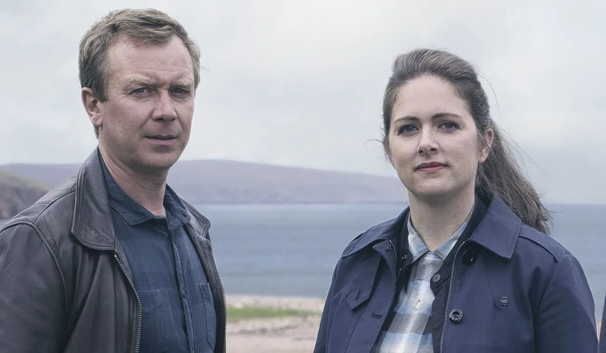 On the left, Steven Robertson as DC Sandy Wilson, on the right, Alison O'Donnell as DS Alison McIntosh in Shetland season 7