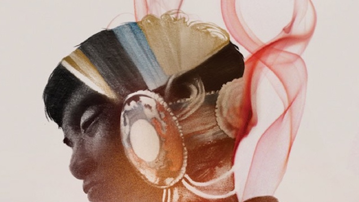 Detail from the cover of Mapping the Interior by Stephen Graham Jones. A Native man in regalia is superimposed over a young boy.