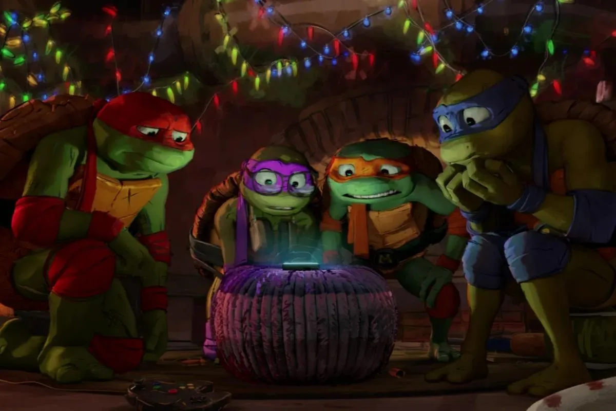 Turtles in TMNT all hovered over a phone call.