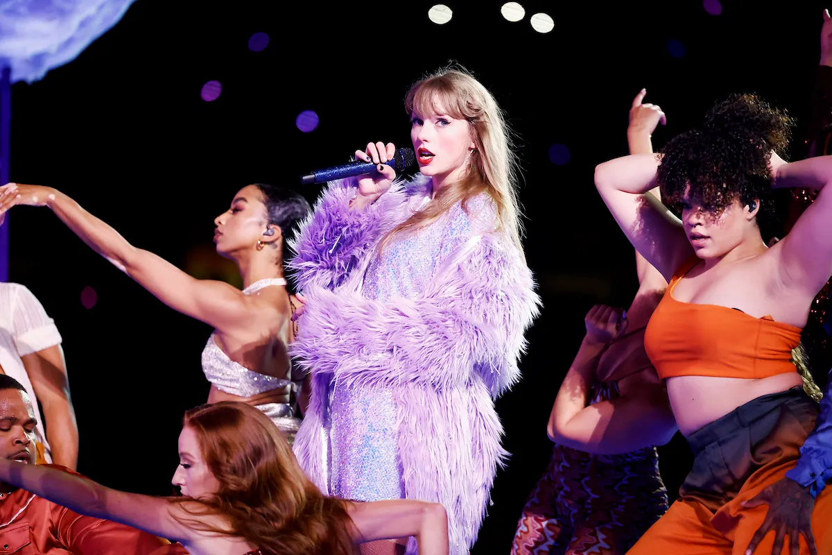 Taylor Swift performs with backup dancers at 'The Eras Tour'.