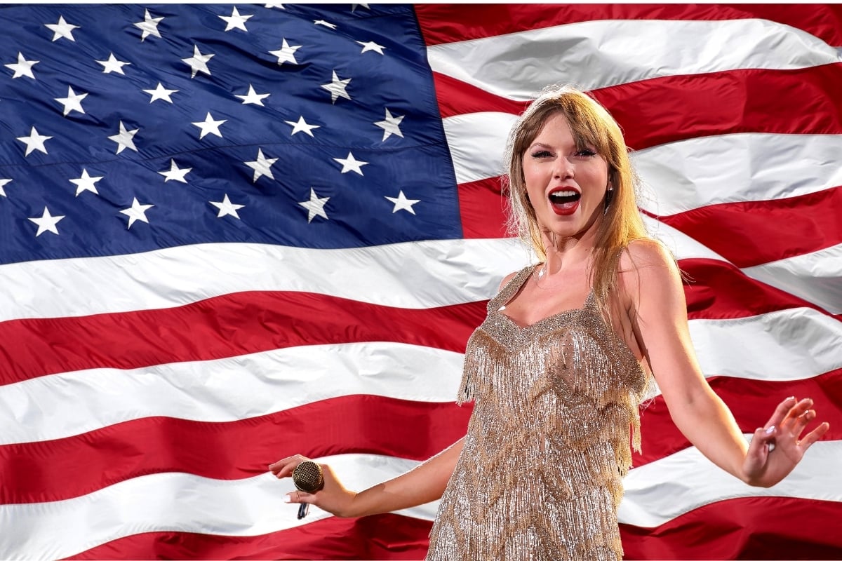Taylor Swift standing in front of an American flag