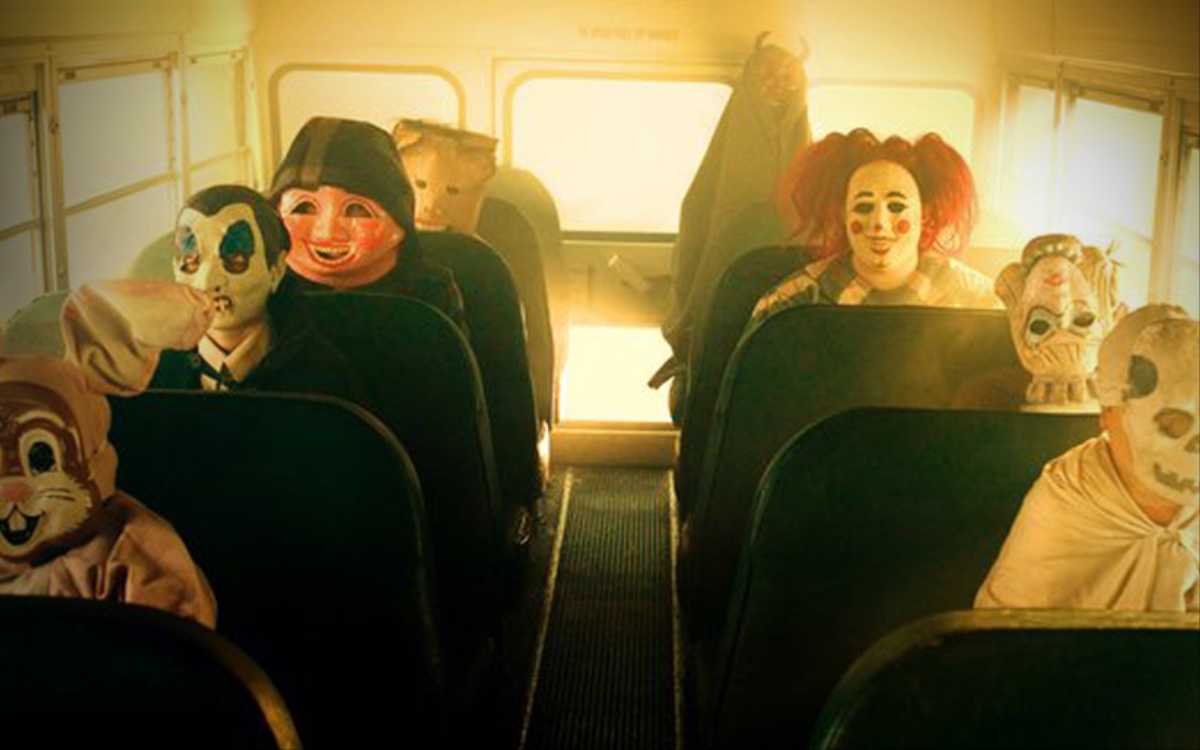 Creepy children on a school bus in Trick 'r Treat