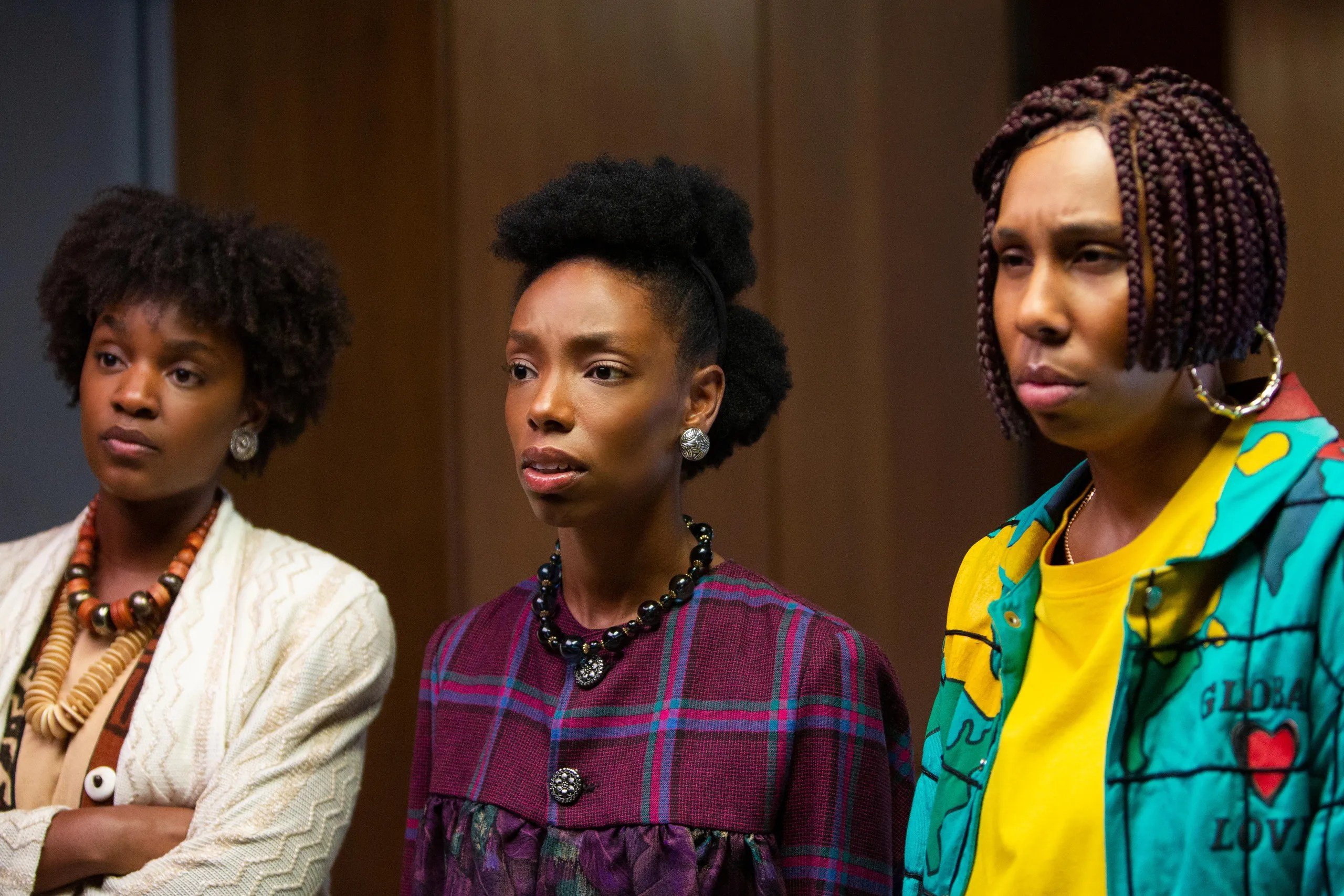 Sista Soul (Yaani King), Anna Bludso (Elle Lorraine), and Brook-Lynne (Lena Waithe) concentrate in a production meeting in ‘Bad Hair.’ 