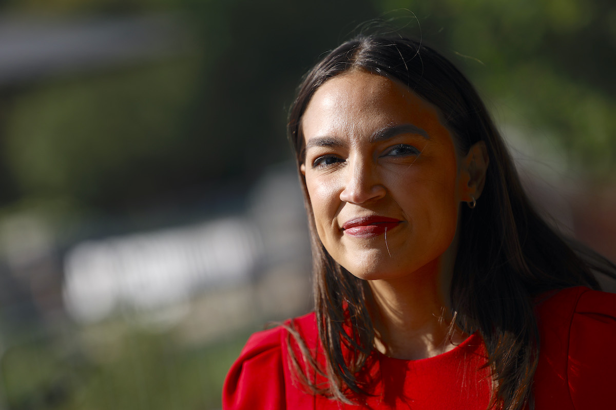 Alexandria Ocasio-Cortez smiles
