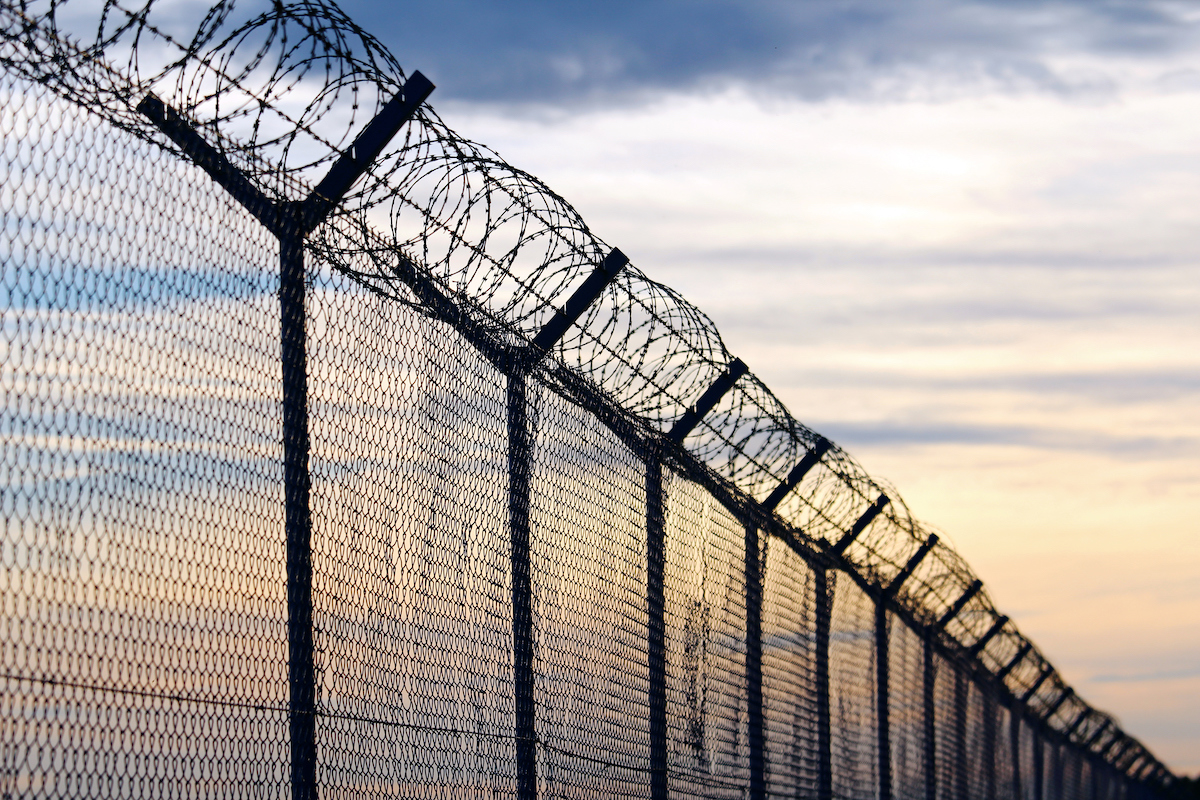 prion fence over night sky