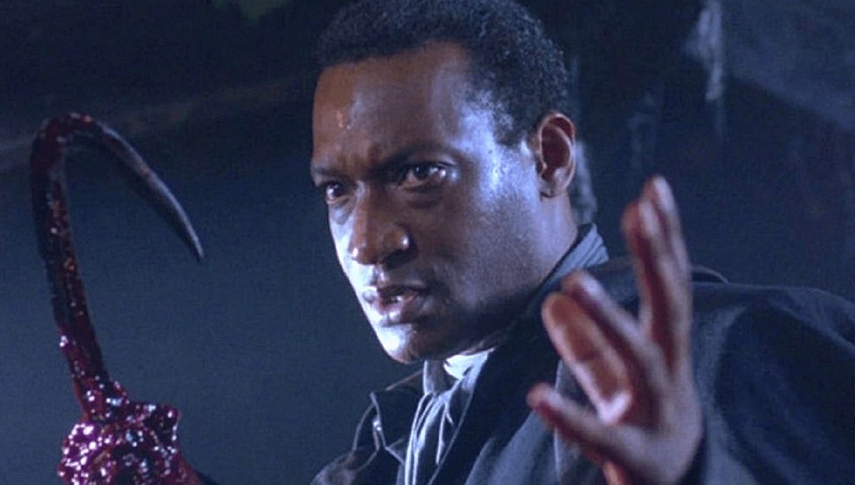 The ghostly Candyman (Tony Todd) wields a hook hand covered in blood in "Candyman"
