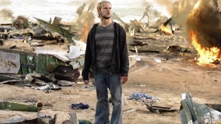 Charlie Pace (Dominic Monaghan) standing amongst the plane wreckage in 'Lost'.