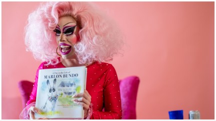 AUSTIN, TEXAS - AUGUST 26: Austin, Tx drag queen Brigitte Bandit reads a book during a drag time story hour at The Little Gay Shop fashion accessories store on August 26, 2023 in Austin, Texas. SB12, a bill seeking to regulate sexually oriented performances by restricting such performances on the premises of public property, or in the presence of individuals younger than 18 years of age, goes into effect September 1, 2023. The ACLU of Texas is representing local LGBTQ groups, businesses, and drag queen Brigitte Bandit in a lawsuit against state officials enforcing the bill. Among other claims, the lawsuit argues that the bill poses harm and unconstitutional censorship to several types of performers including Broadway plays, theater performances, cheerleading, and drag shows. (Photo by Brandon Bell/Getty Images)