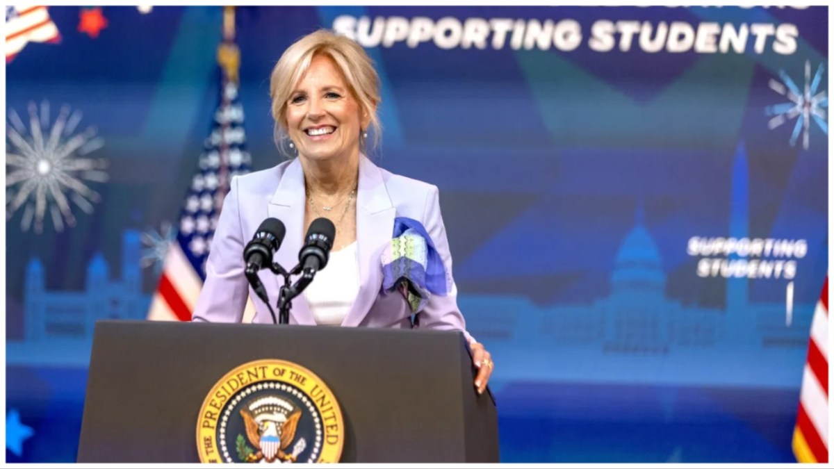 First Lady Jill Biden speaks at a National Education Association event at the White House in July 2023. A sign behind her reads, "Supporting educators, supporting students." Credit: Tasos Katopodis/Getty Images