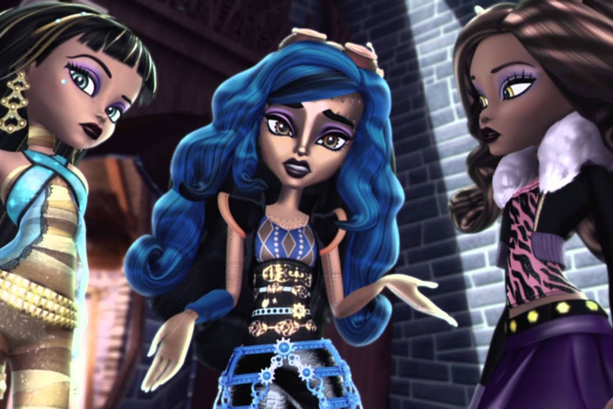 Monster High: frights, camera, action!; Cleo de Nile, in blue and gold, stands next to Robecca, a bronze skinned, blue haired, robot, with Clawdeen on her other side.