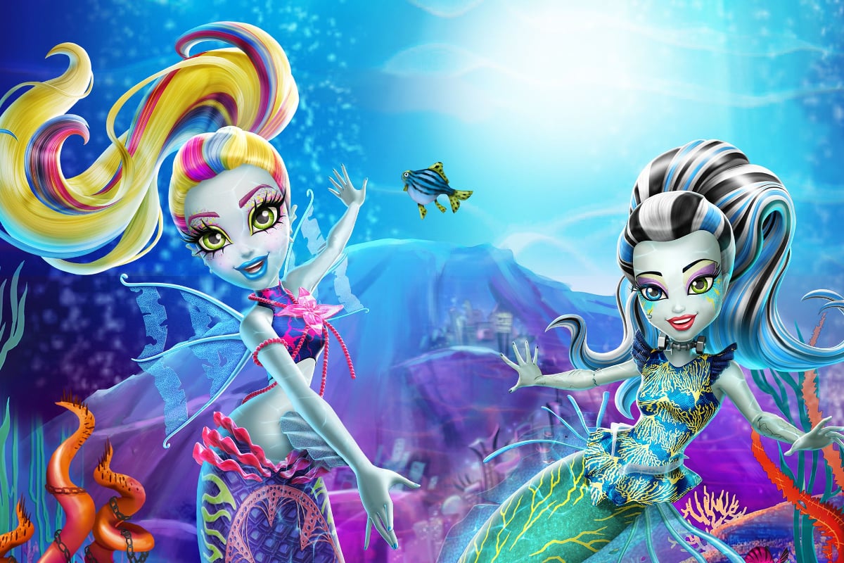Monster High: Great Scarrier Reef; Laguna Blue and Frankie Stein swim beside each other in front of a coral reef. Both have ponytails and mermaid tails.