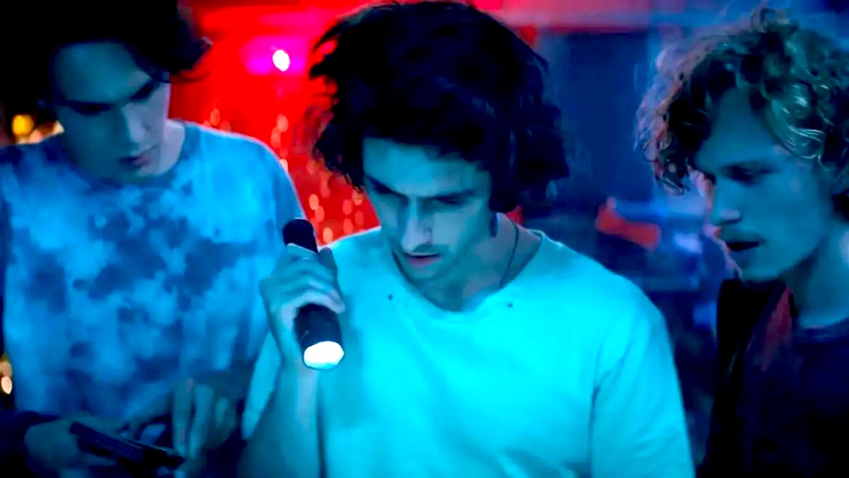 A group of friends investigating a sketchy room in 'Monsters of California'.