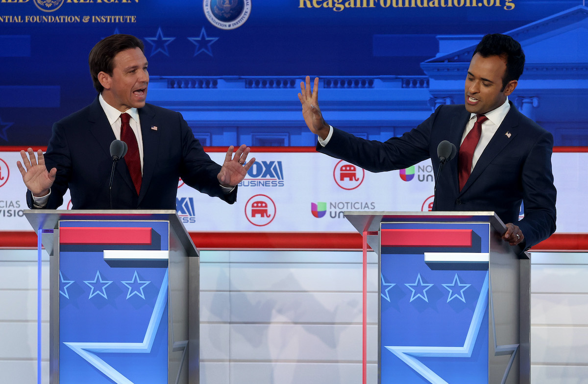 Ron DeSantis and Vivek Ramaswamy yell at each other during the Republican debate.