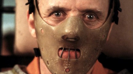 Hannibal Lecter (Anthony Hopkins) staring menacingly in a leather mask in 