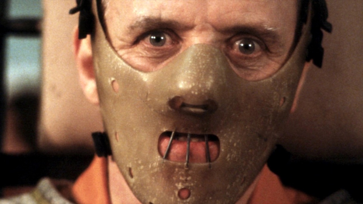 Hannibal Lecter (Anthony Hopkins) staring menacingly in a leather mask in "Silence of the Lambs".