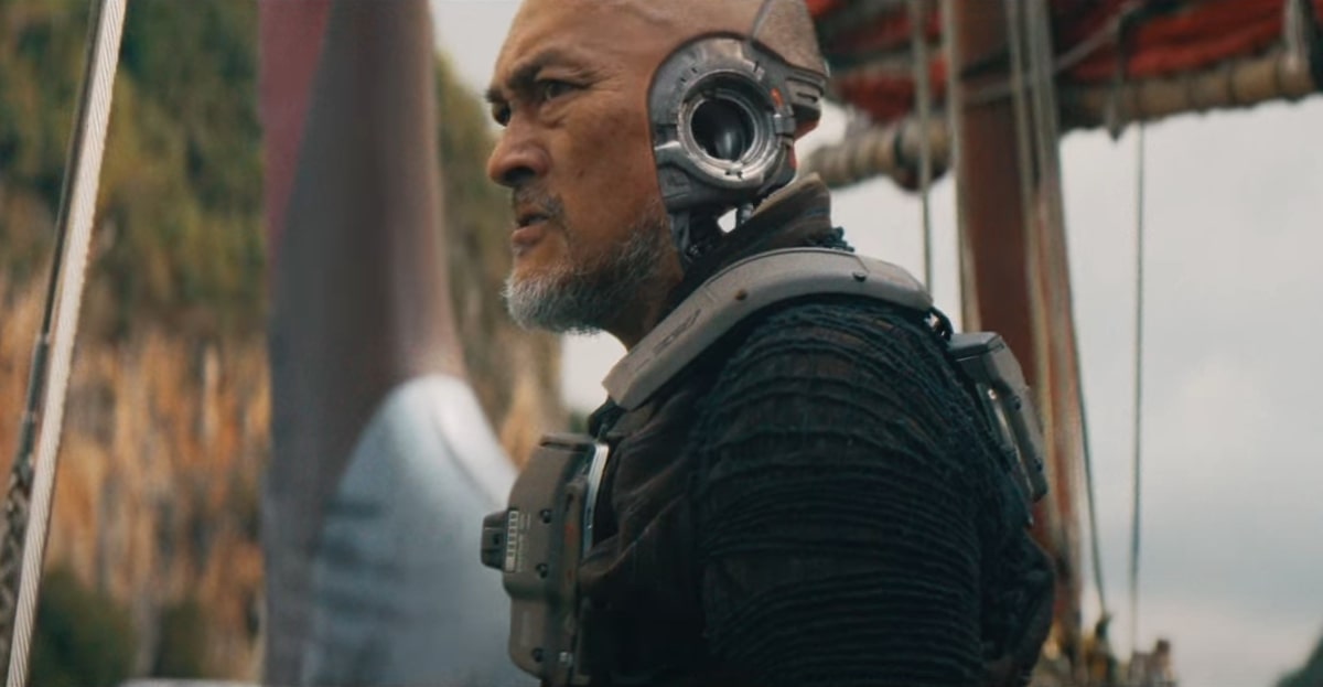 An android staring off into the distance in 'The Creator'