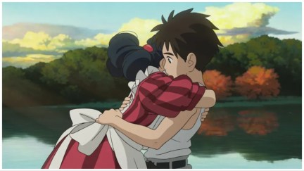 Two characters hug in Studio Ghibli's 'The Boy and the Heron'.