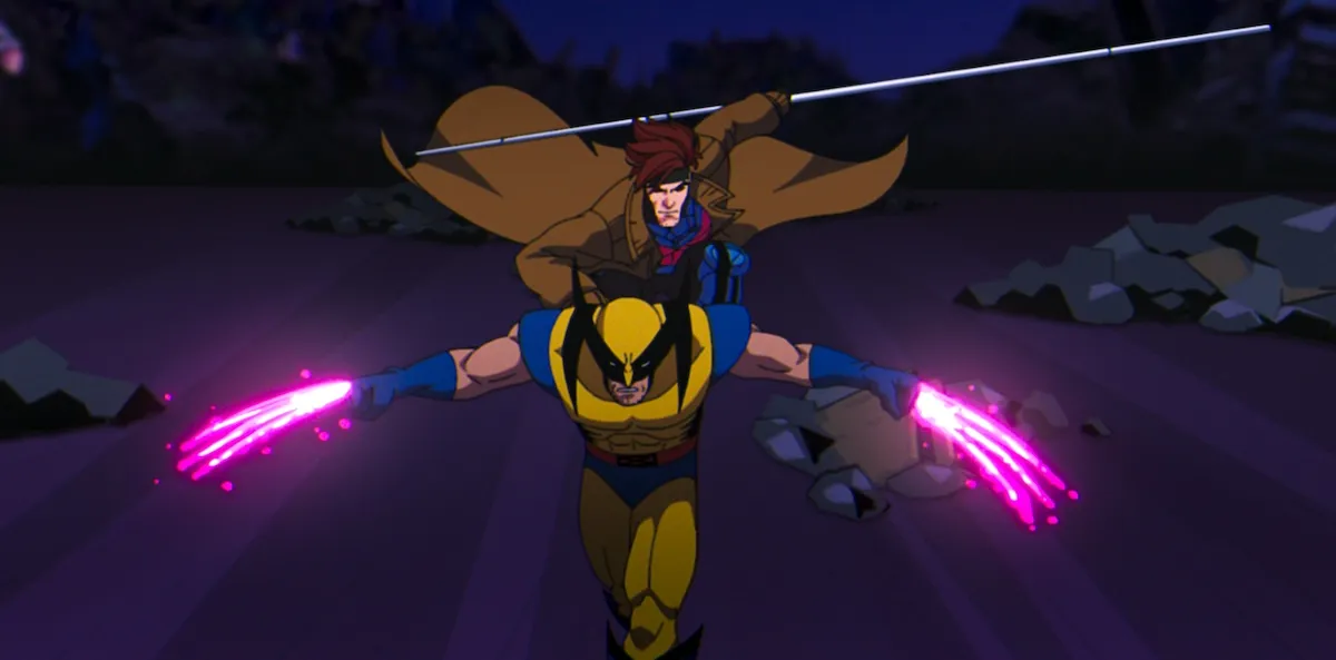 Gambit rides on Wolverine's back, charging his claws with electricity.