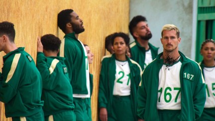 Photo of contestants in Netflix's Squid Game: The Challenge. They are wearing the same green uniforms as the contestants from the drama show of the same name.