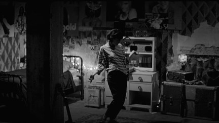 A young woman dances in her room in 'A Girl Walks Home Alone at Night'