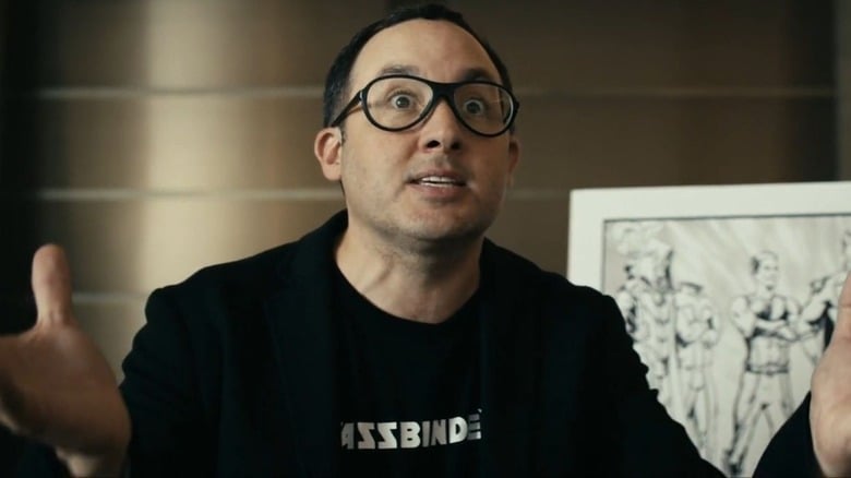 P.J. Byrne as Adam Bourke. A white man in glasses looks intense as he gestures in 'The Boys.'