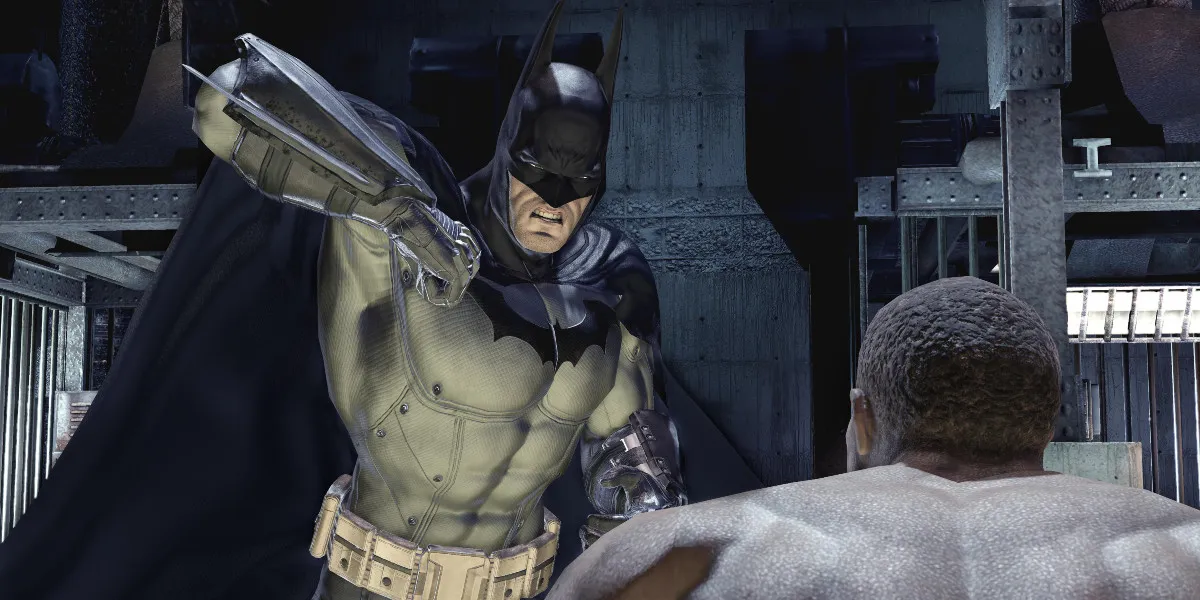 Batman fighting a criminal in Batman: Arkham Asylum