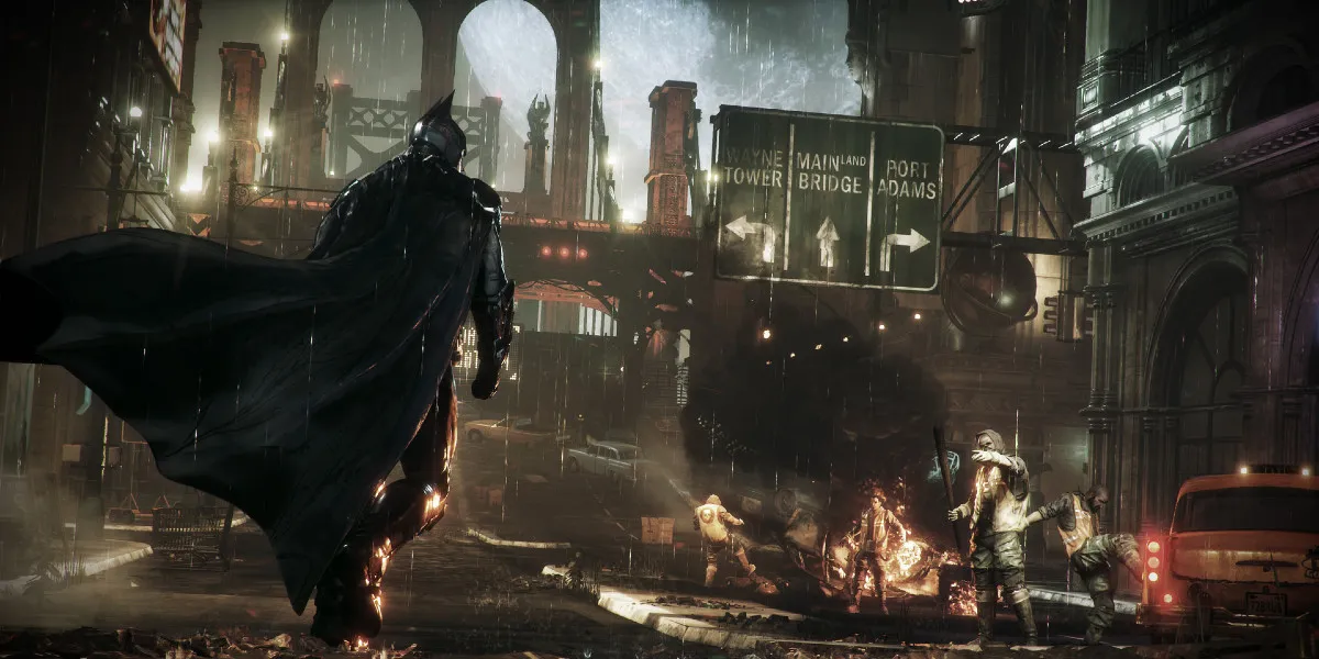 Batman walking in a destroyed Gotham in Batman: Arkham Knight