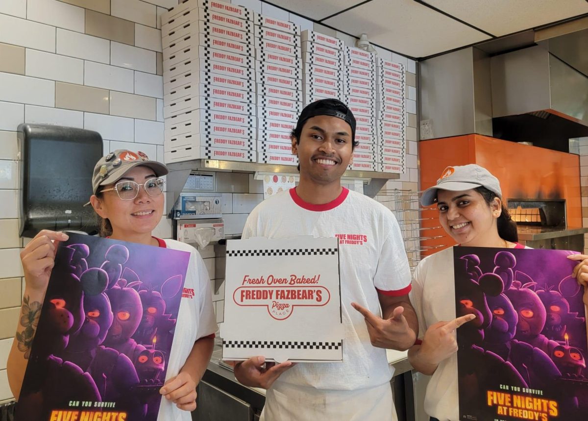 Blaze Pizza workers with Freddy Fazbear Pizza Boxes