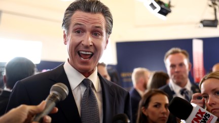 California gov. Gavin Newsom makes a creepy face while answering questions after a Republican primary event in California.