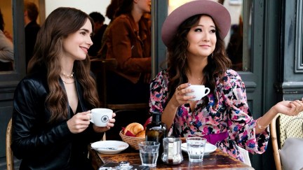 Lily Collins as Emily Cooper and Ashley Park as Mindy Chen in Emily in Paris