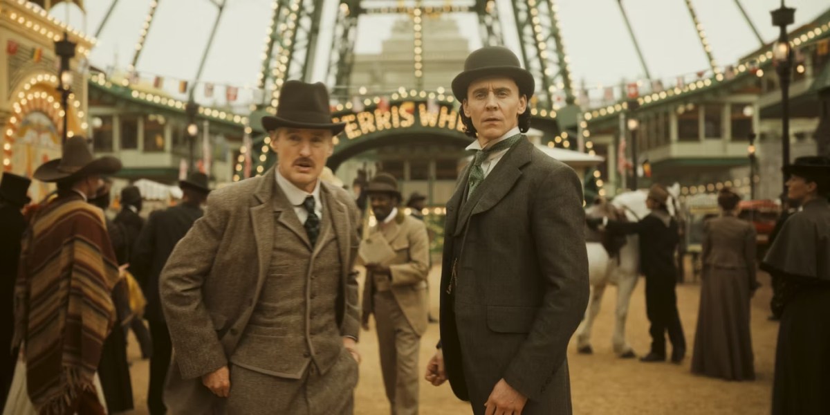 Loki and Mobius stand in front of the Ferris wheel at the 1893 World's Fair in 'Loki'