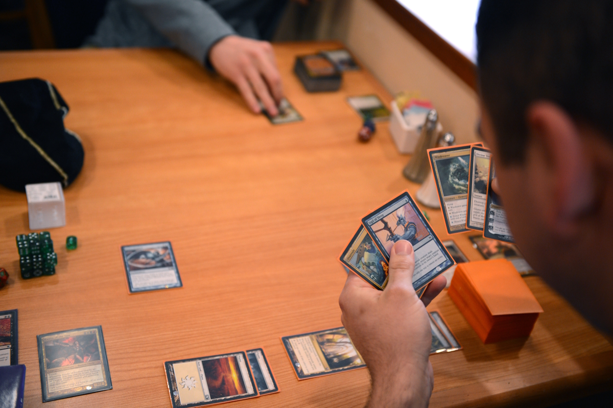 Two people playing magic the gathering