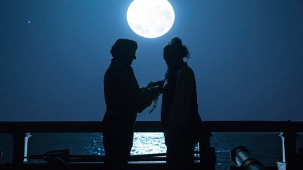 Two men silhouetted on the deck of a ship in the moonlight in 'Our Flag Means Death.'