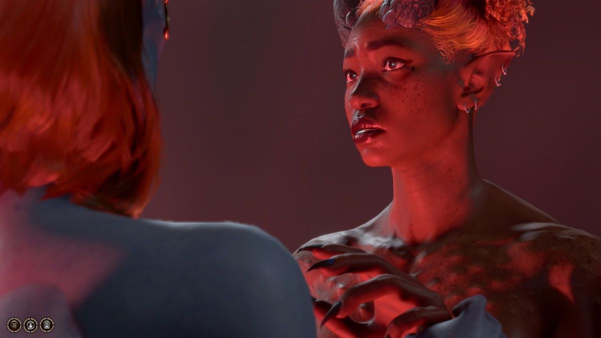 Mizora guides Tavs hands during the romance scene with the half-fiend.