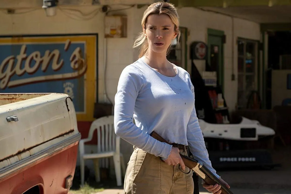 Betty Gilpin with a gun in "The Hunt." 