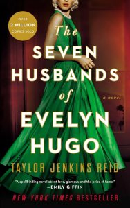 book cover featuring blonde woman wearing a green dress. Text says The Seven Husbands of Evelyn Hugo by Taylor Jenkins Reid