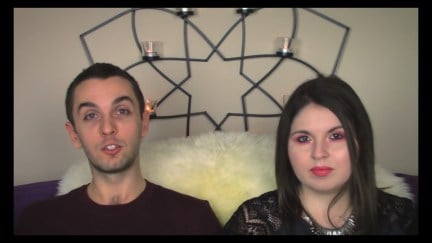 A white man and white woman on a video chat talk to their class in 'Desperately Seeking Soulmate: Escaping Twin Flames Universe'.