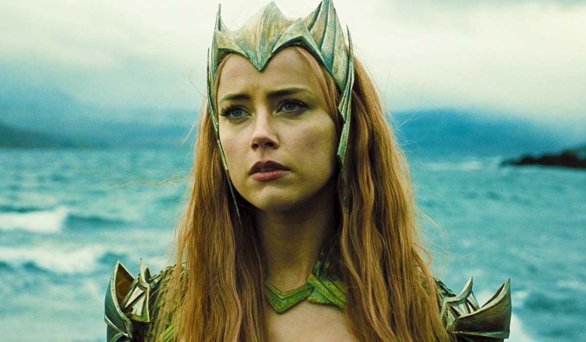 Amber Heard looks wistful as Mera in a scene from Aquaman 2.