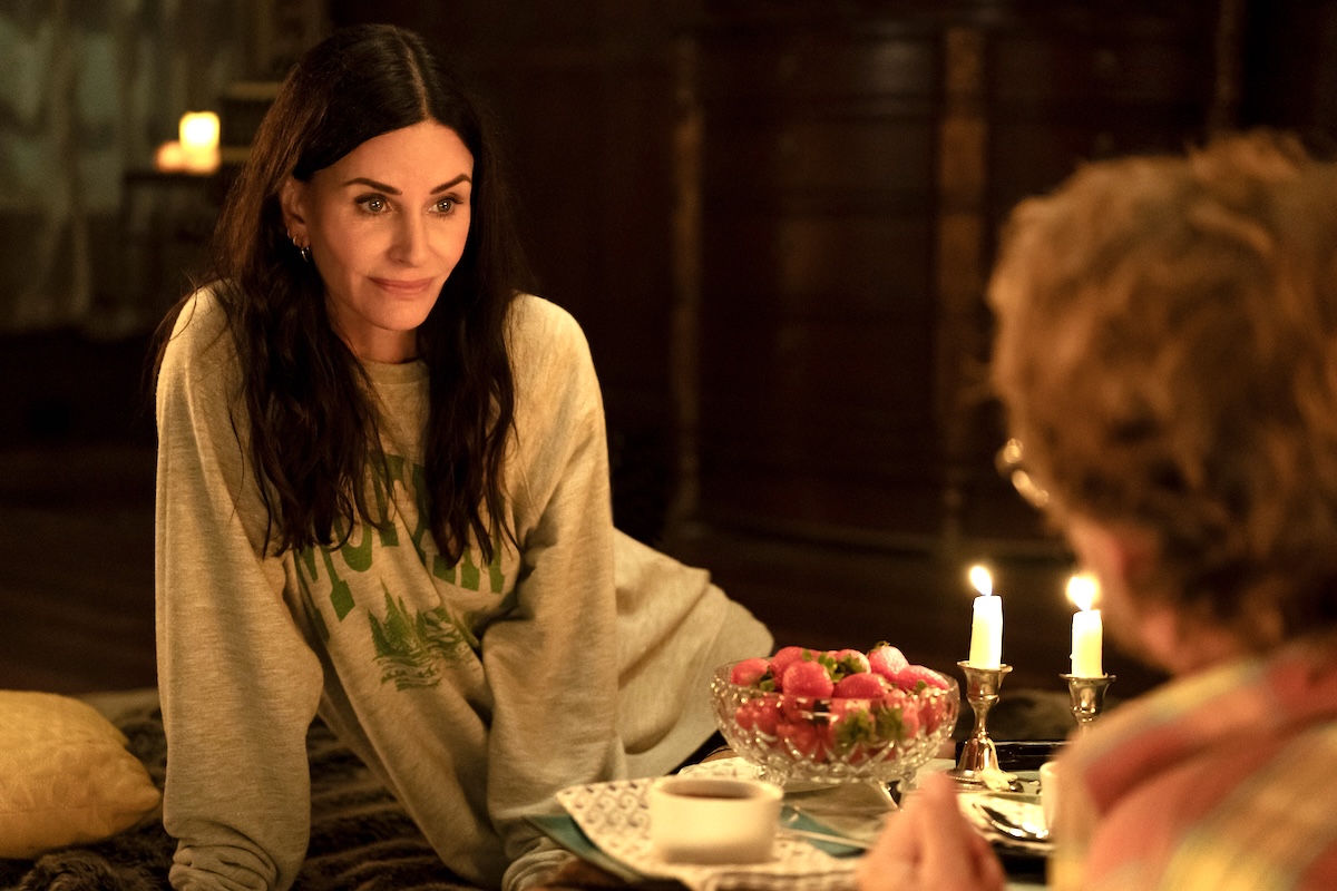 Courtney Cox sitting down in Shining Vale