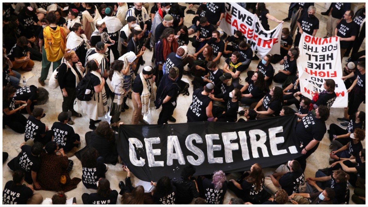 WASHINGTON, DC - OCTOBER 18: Protesters stage a demonstration in support of a cease fire against the Palestinians in Gaza in the Cannon House Office Building on October 18, 2023 in Washington, DC. Members of the Jewish Voice for Peace and the IfNotNow movement staged a rally to call for a cease fire in the Israel–Hamas war.