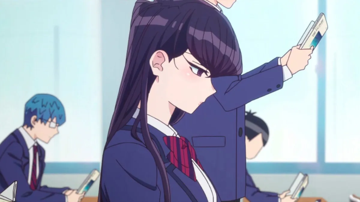A high school girl sits silently at her desk in "Komi Can't Communicate"
