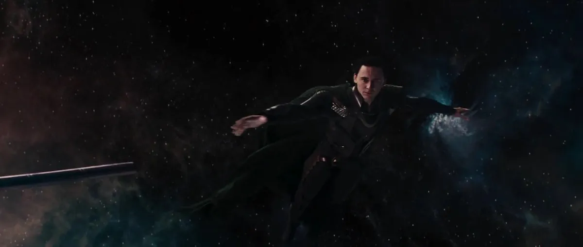 Loki, having just let go of Odin's spear, falls into space in Thor.