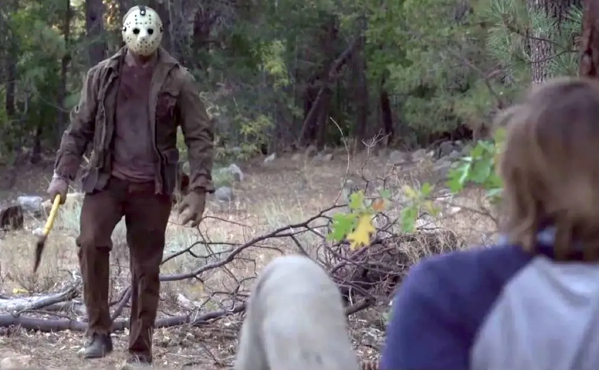 Jason Voorhees approaching a victim in Never Hike Alone.