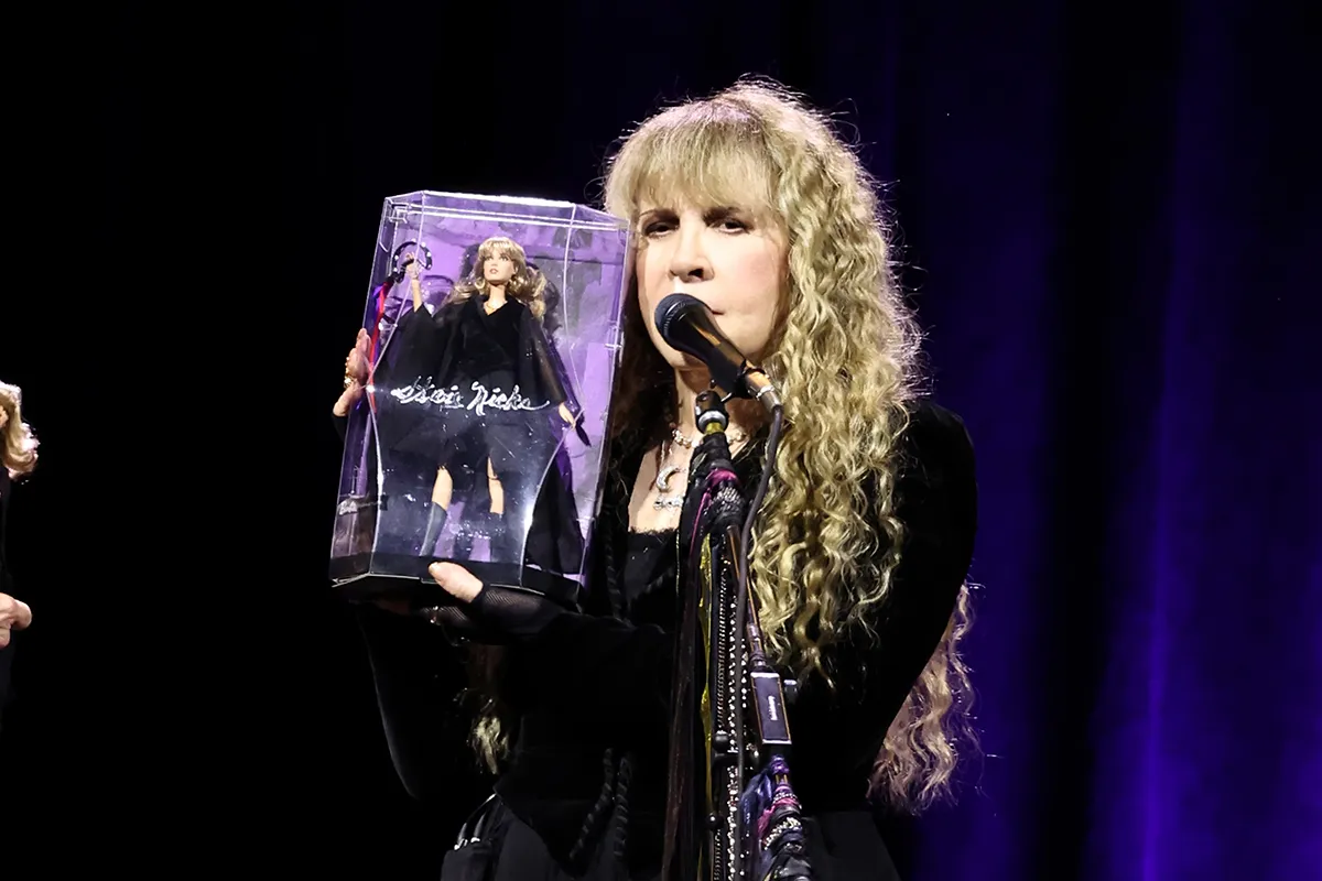 Stevie Nicks unveils the Barbie doll based on her likeness during a performance in New York City