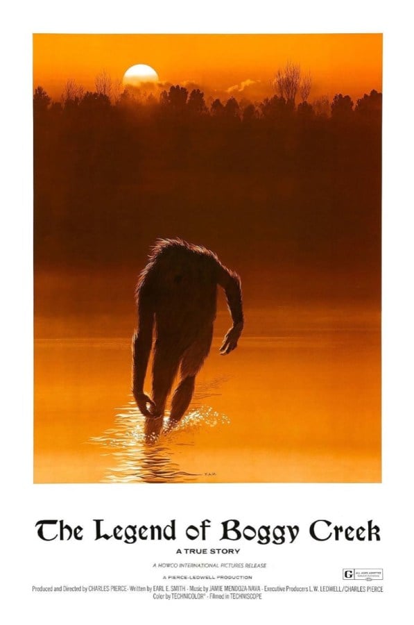 A Bigfoot creature emerges from a a river at sunset in "The Legend of Boggy Creek"