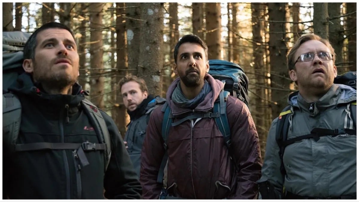 Four men stand in the woods in "The Ritual"